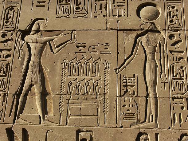 istock Egyptian basrelief and hieroglyphs 144272942