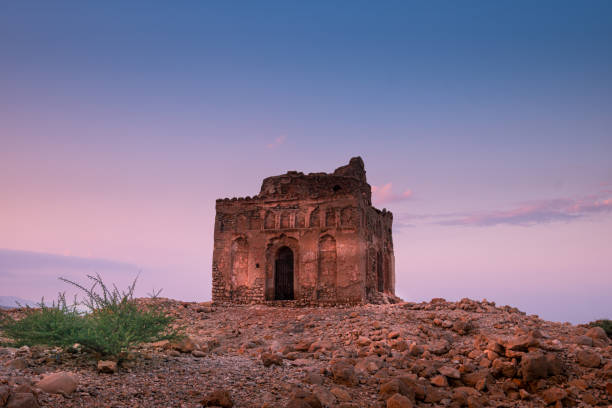 istock Sunset sky at Bibi Mariam's Tomb at Qalhat ruins, Oman 1442732022