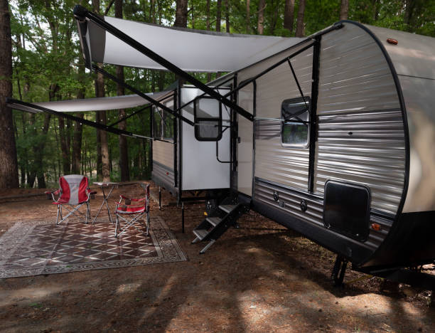 istock Two ownings out in a camping trailer campsite 1442736581