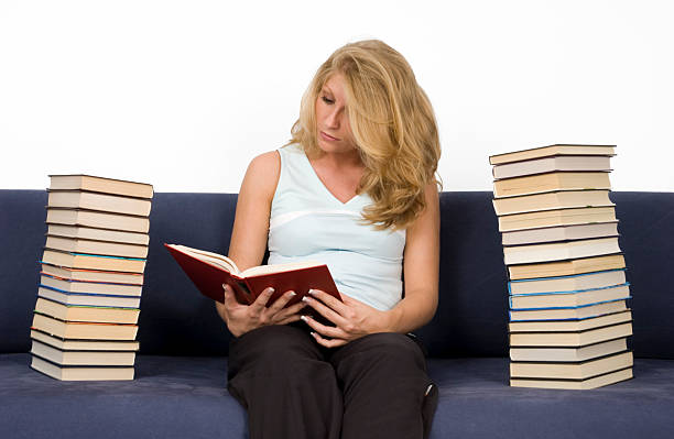 Woman reads books.