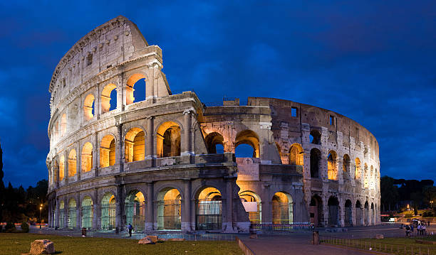 The magnificent Colosseum at dusk in Rome stock photo