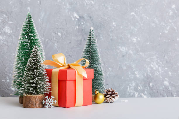 istock Christmas composition. craft Gift box, small tree, branches and craft DIY decorations on white background. New year concept. Christmas home decoration Flat lay, top view, copy space 1442738435