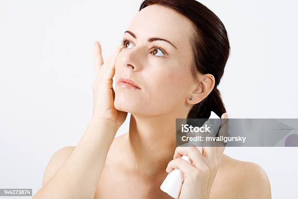 Natural Beauty Applying Lotion Stock Photo - Download Image Now - Beauty, Beauty In Nature, Beauty Product