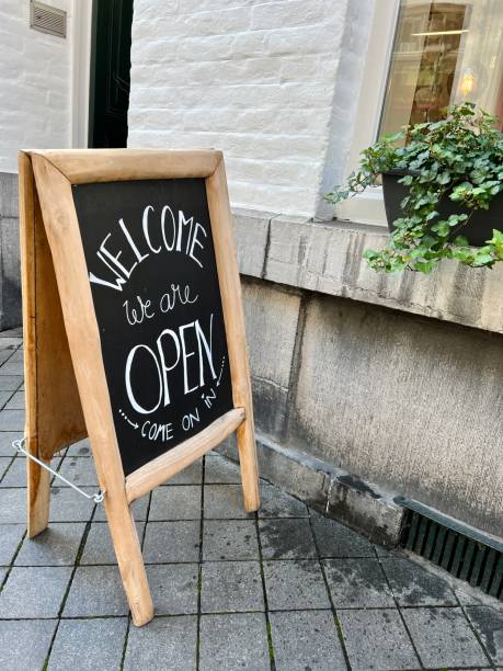 istock open sign board in front of a shop 1442738976
