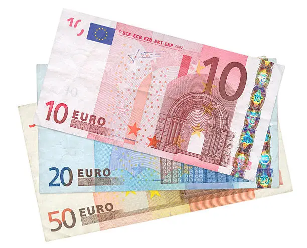 close-up of three Euro banknotes isolated on white background, see also: