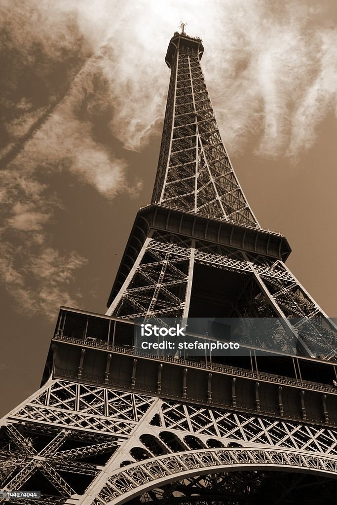 The Eiffel Tower, wide-angle view The Eiffel Tower, wide-angle view; sepia toning Arch - Architectural Feature Stock Photo