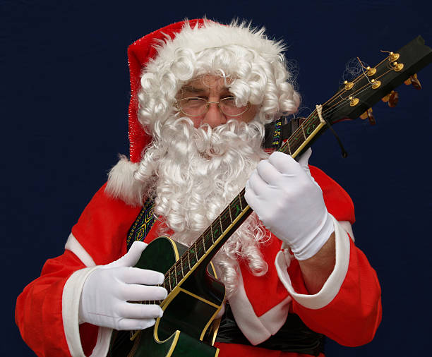 istock Santa playing christmas carols 144274230