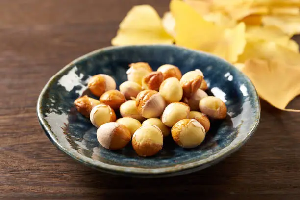 image of Ginkgo nuts on wooden background