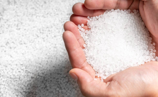 istock engineer hold white plastic on hand polymer petrochemical product as polymer raw material for plastic in polymer chemical industry design and test in polymer science laboratory 1442746279