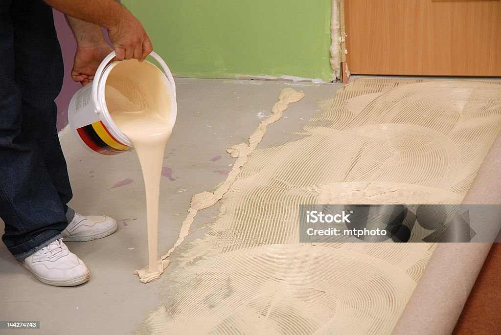 Pooring Special Glue For Carpet Stock Photo - Download Image Now