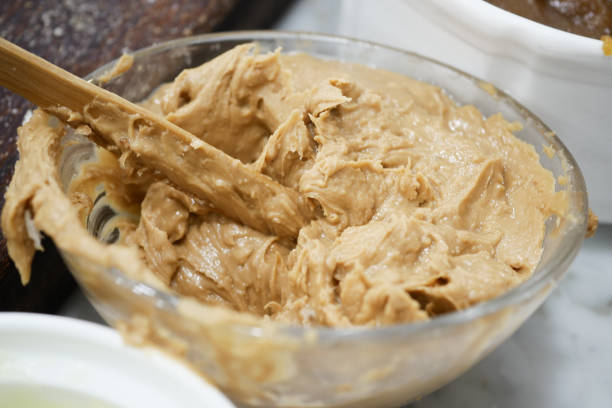 istock top view of peanut butter in a container , 1442747868