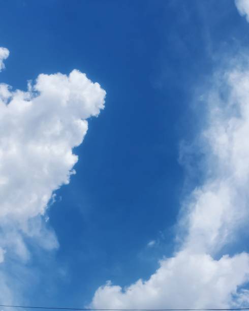 istock white clouds and blue sky in indonesia 1442748395