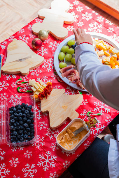 istock Construction of a cheese board for a Christmas gathering 1442749849