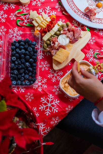 istock Construction of a cheese board for a Christmas gathering 1442750777