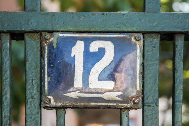 istock Weathered enameled plate number 12 1442752716