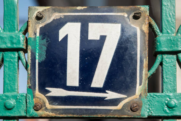 istock Weathered enameled plate number 17 1442752728