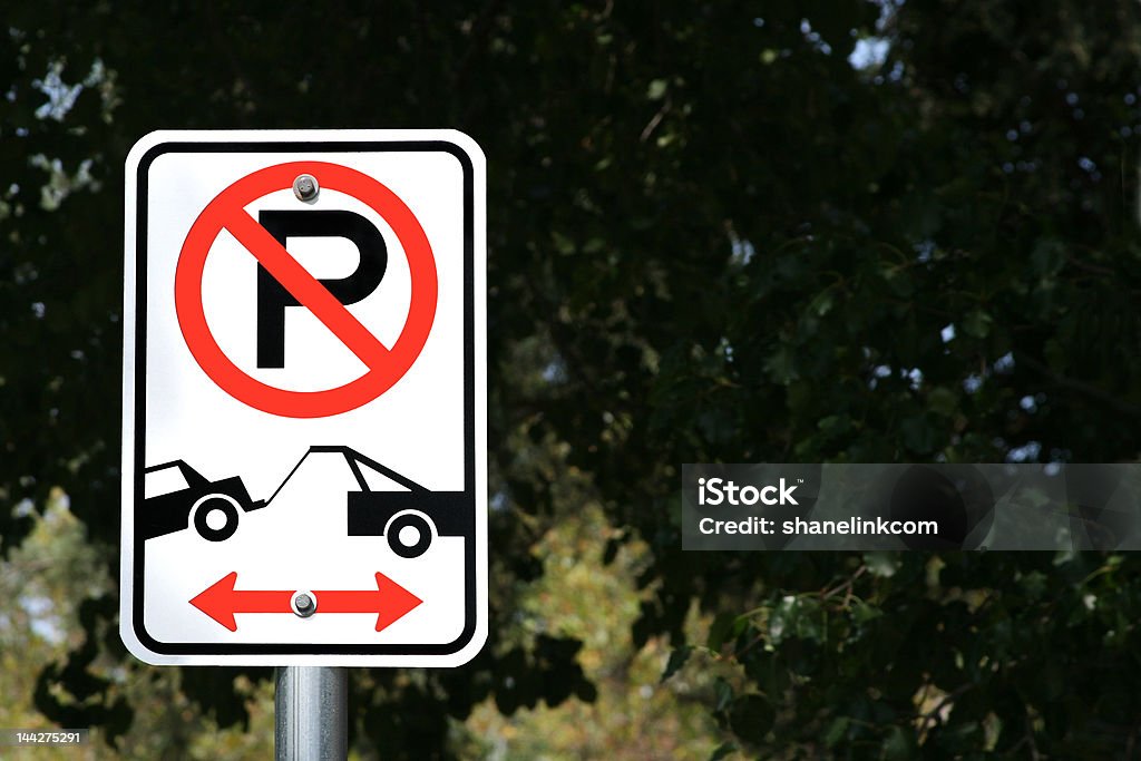 No Parking Tow Away Zone A photograph taken in Oklahoma. Arrow Symbol Stock Photo