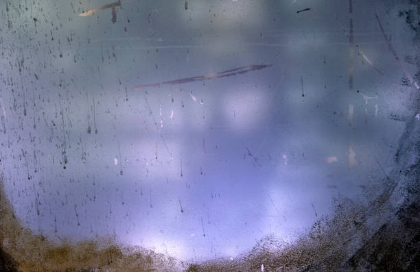 istock Strokes paint on a window pane, painting grunge background 1442753804