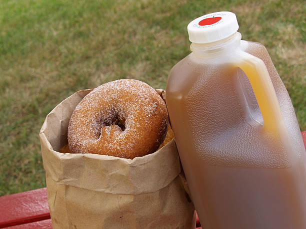 apple cider and donuts stock photo