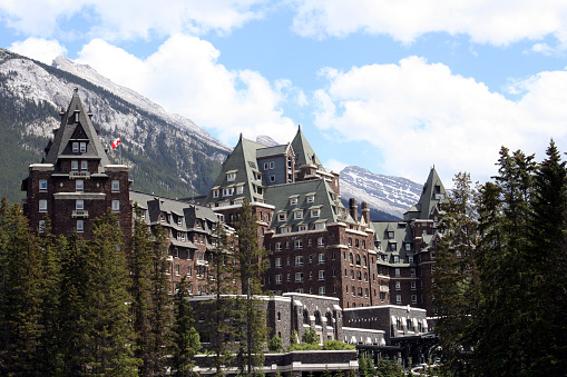 A hotel in the forest and mountains.