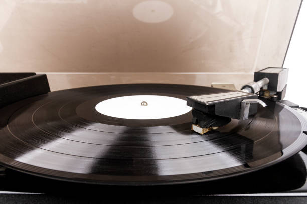istock Close up of turntable needle on a vinyl 1442758212
