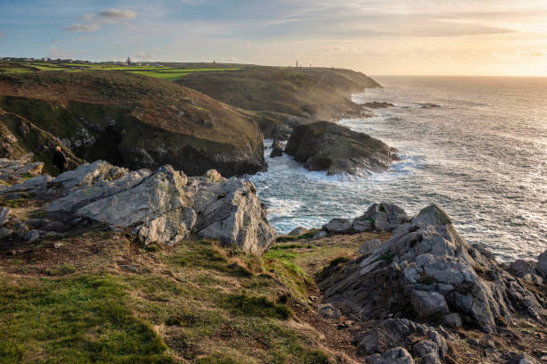 istock Stunning sunset landscape image of Cornwall cliff coastline with tin mines in background viewed from Pendeen Lighthouse headland 1442760492