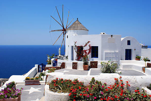 istock An old mill by a cliff on an all-white structure 144276118