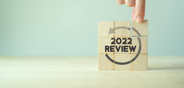 Annual review in 2022, business, customer review. Review evaluation time for inspection assessment auditing. Review for learning, improvement, planning and development. End of year business concept. stock photo
