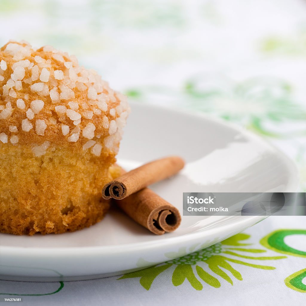 Apple Muffins Apple muffin and cinnamon sticks on white plate Apple - Fruit Stock Photo