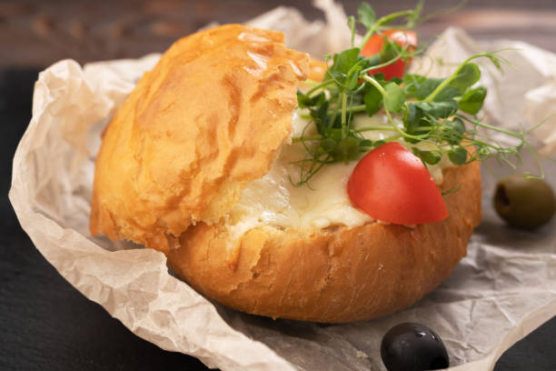 istock Bread roll baked with cheese, shrimps and mushrooms 1442761871