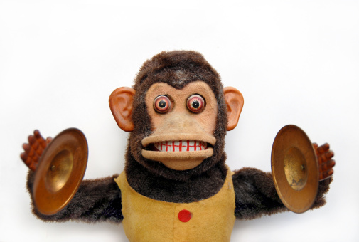 Vintage mechanical monkey toy with cymbals