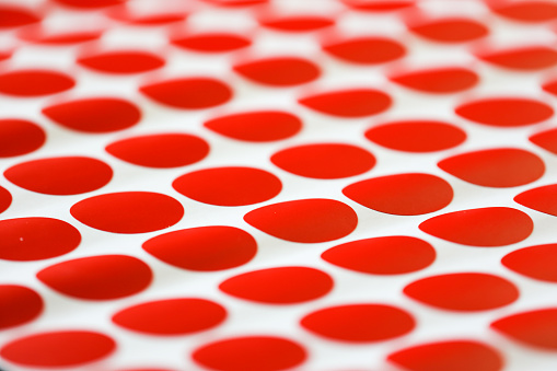 Red dots on white background