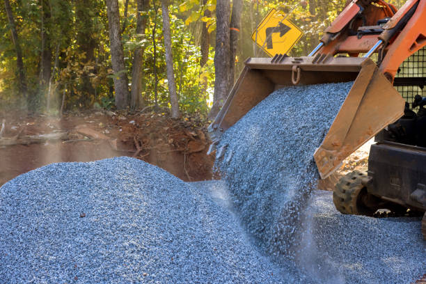 istock This was an excavator with a bobcat loader that was used to unload crushed stone during the road repair work on the site. 1442769618