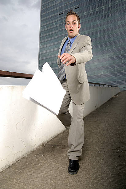 Butterfingers businessman stock photo