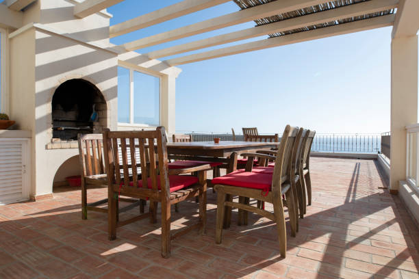 istock Outdoor dining area with table and chairs on a paved terrace 1442774749
