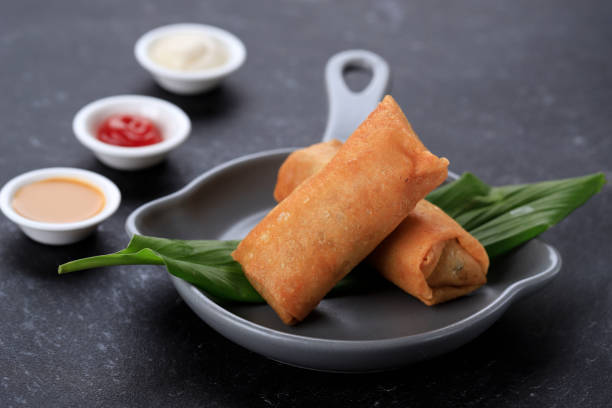 istock Fried Spring Roll with Peanut Sauce, Chilli Sauce, and Mayonaise 1442775789