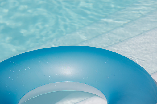inflatable ring in the clear water of a swimming pool