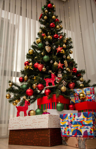 istock Christmas Tree and Christmas gift at home 1442781490