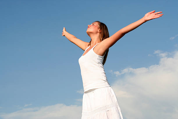 istock Woman with arms outstretched 144278203