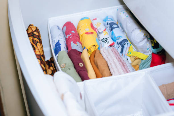 istock Baby clothes neatly arranged in the wardrobe 1442784113