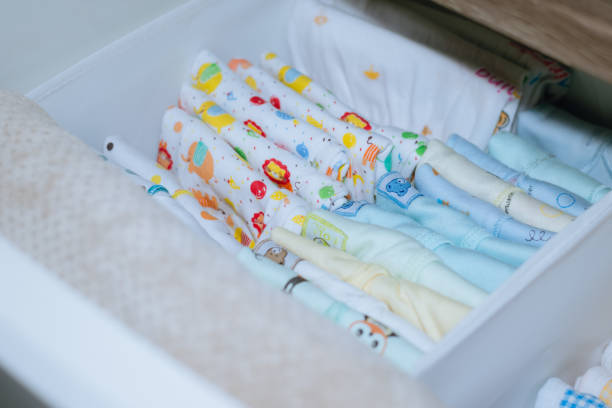 istock Baby clothes neatly arranged in the wardrobe 1442784148