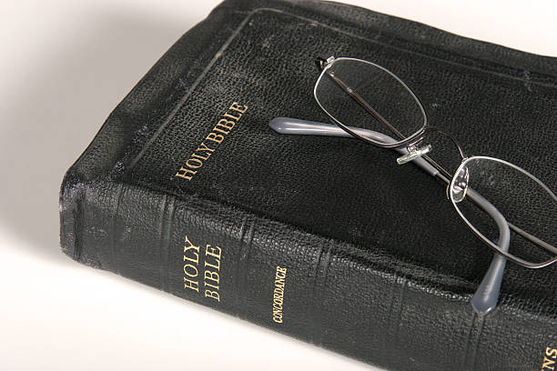 istock Vintage Bible with Eyeglasses 144279201