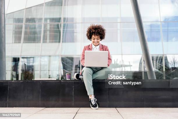Business Woman Using Laptop Outdoors Stock Photo - Download Image Now - People, One Person, Laptop