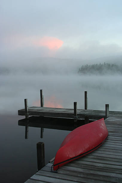 istock Dock in Early Morning Fog 144279441