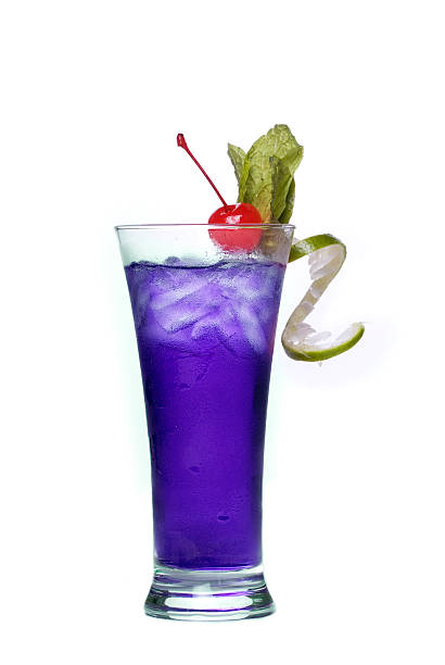 istock A purple iced drink in a glass with a cherry and lime 144279499