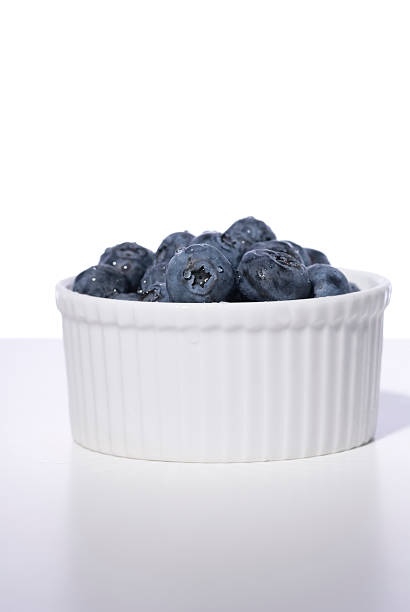 Fresh Bowl of Blueberries stock photo