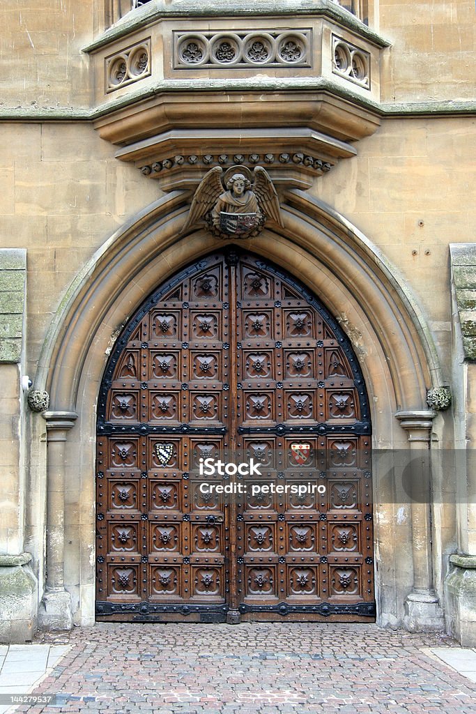 Medieval college door, Oxford Magnificent carved doors at Oxford University, leading into Exeter College.  Exeter's most famous graduate is J.R.R. Tolkien. Oxford - England Stock Photo