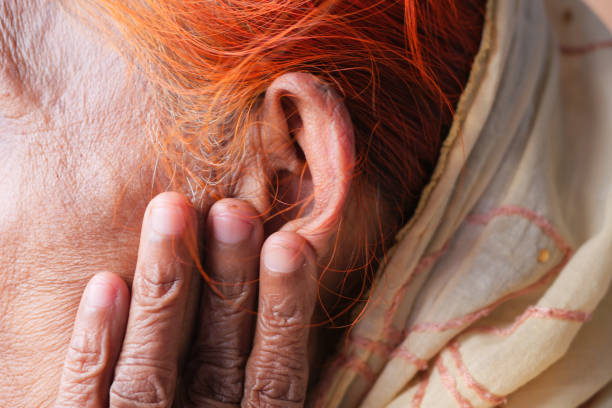 istock senior women having ear pain 1442795711