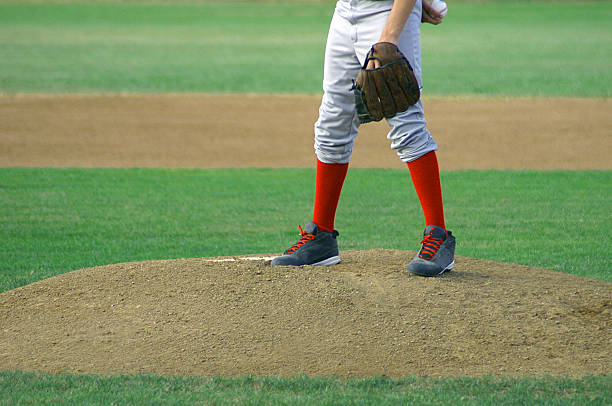 istock Pitcher standing on mound waiting to pitch a ball 144279667