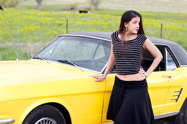 istock Girl with car 144279678